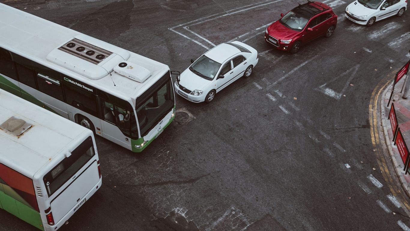 two bus and three cars